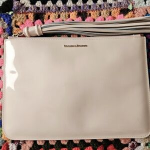 Dooney & Bourke Pale Pink Patent Leather Large Carrington Pouch